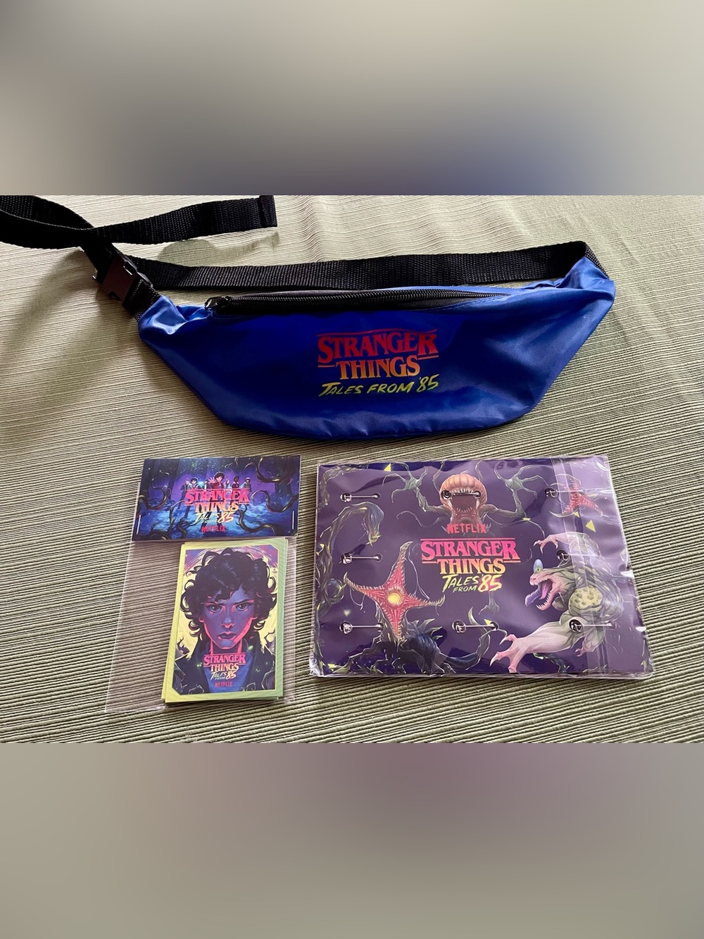 Netflix Stranger Things blue fannypack with red & yellow logo + themed cards